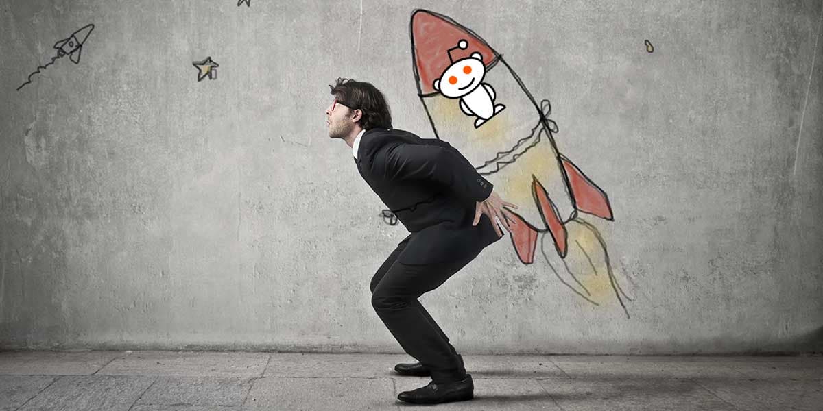 The Reddit logo on a marketing strategy backdrop